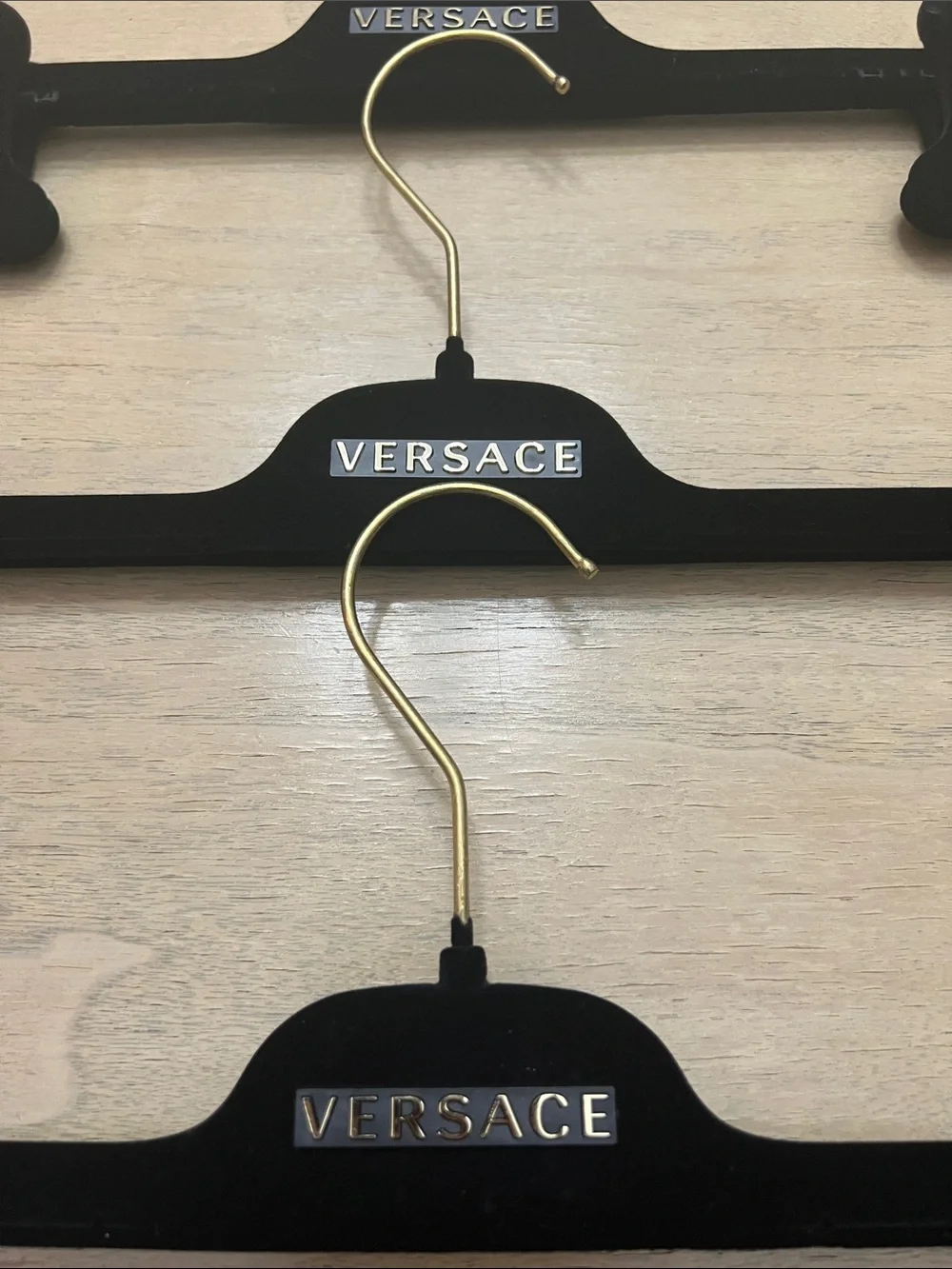Hangers with Versace label
